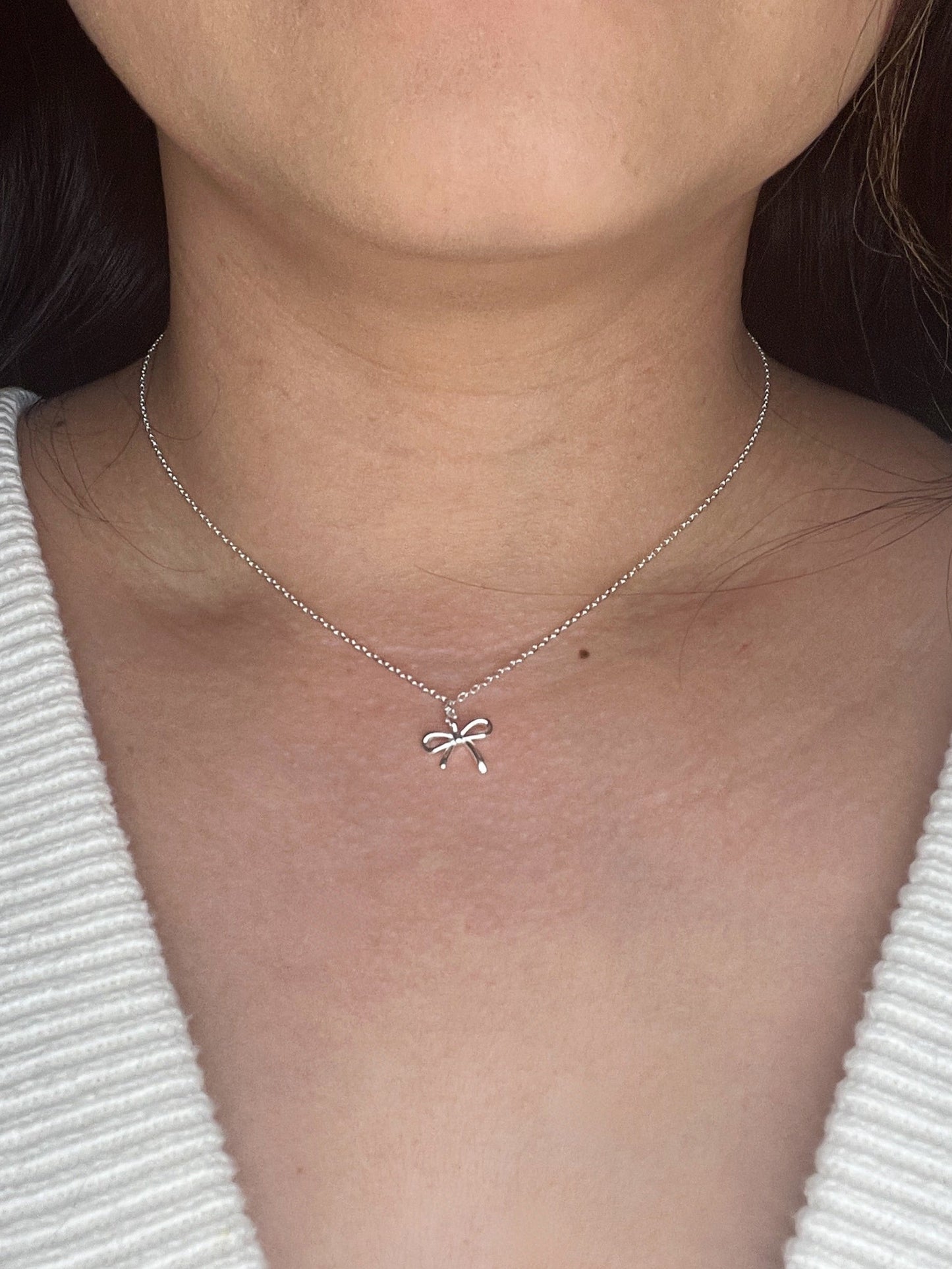 SILVER BOW NECKLACE